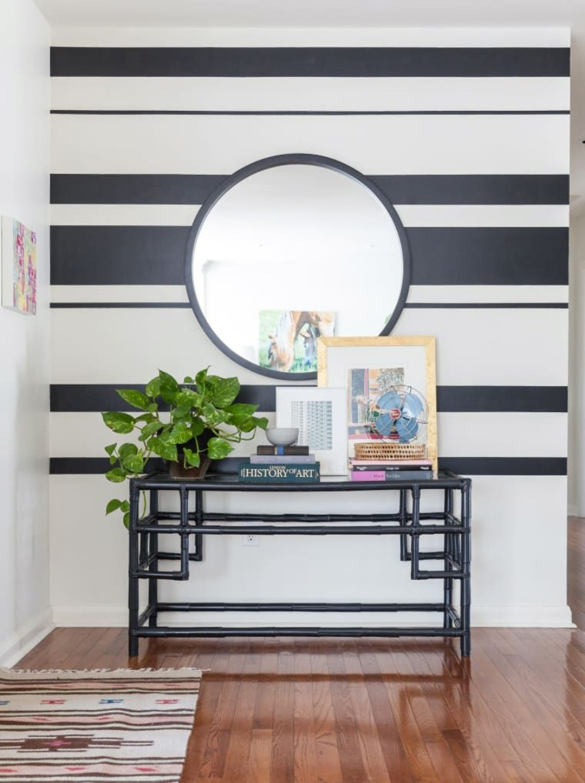 A striped entryway is the perfect spot for stripes! Source: Apartment Therapy